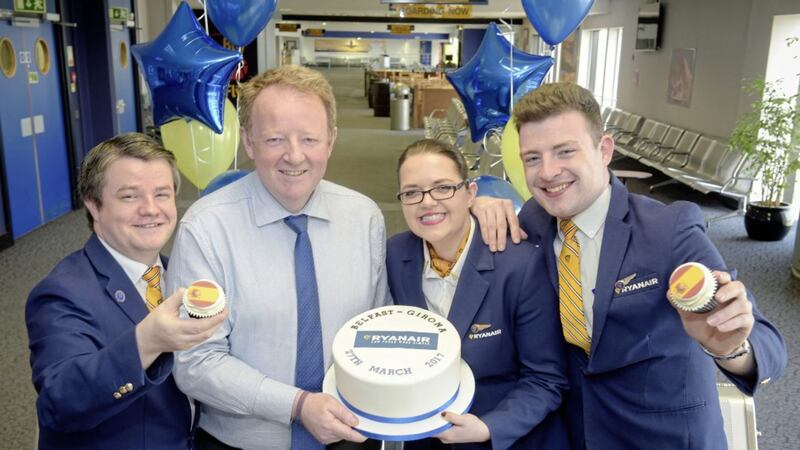At the start of the Ryanair service to Girona, Belfast International Airport reported its sixth successive month of record passenger figures. Pictured with airport managing director Graham Keddie are (from left) Ryanair&rsquo;s base supervisor Sean Mullan and cabin crew members Lucy Hutchinson and Kevin Gannon 