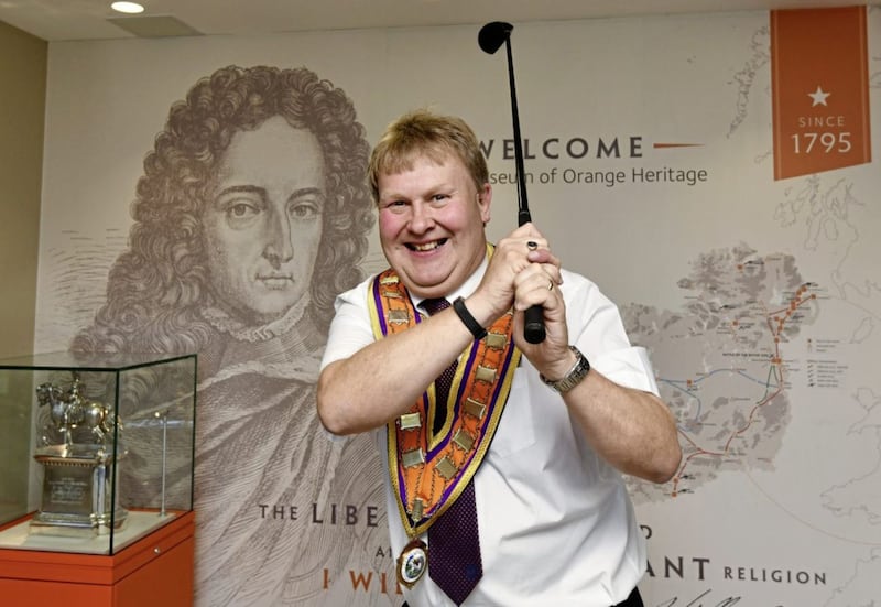 Deputy Grand Master Harold Henning at last month&#39;s launch of a Twelfth leaflet ahead of the Open golf tournament in Portrush, encouraging visitors to watch the parades 