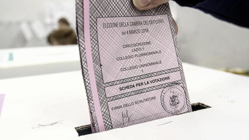 A person casts his ballot at a polling station in Rome on Sunday. Picture by Giuseppe Lami/ANSA via Associated Press 