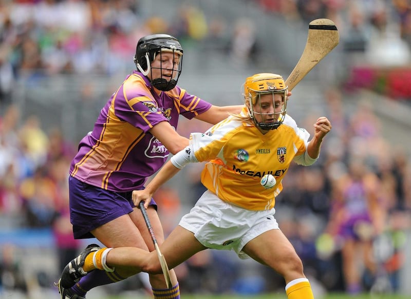 Rossa's Mairiosa McGourty is a superb all-rounder with great experience: McGourty is pictured here in action for Antrim against Colleen Atkinson (Wexford) in the All-Ireland Intermediate Camogie Championship Final at Croke Park, Dublin on September 11 2011