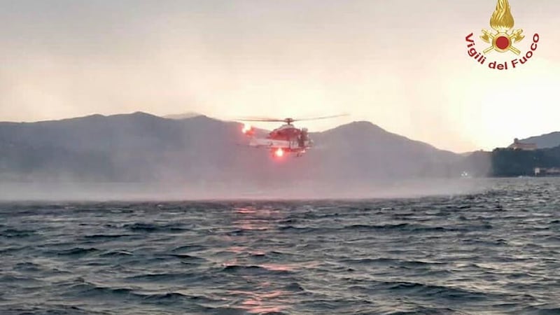 A helicopter searches for the missing after a tourist boat capsized in a storm on Italy’s Lago Maggiore in the northern Lombardy region (Vigili Del Fuoco via AP/PA)