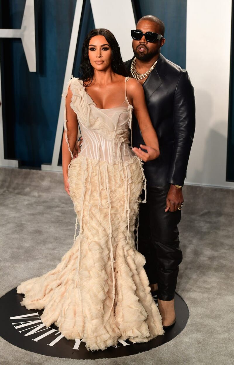 Kanye West with his former wife Kim Kardashian