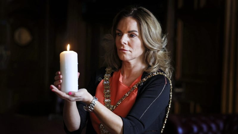 Belfast mayor Christina Black was joined at city hall on Friday by a number of community representatives, including members of the Jewish community, to mark Holocaust Memorial Day. Ms Black lit a candle and observed a moment of reflection to remember those who lost their lives. Picture by Darren Kidd/Press Eye 