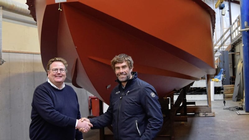 Artemis Technologies chief executive Iain Percy (right) joins Jonas Pederson, managing director at Tuco Marine, to announce a joint venture that will produce the world&rsquo;s first zero emissions workboat in Belfast. 