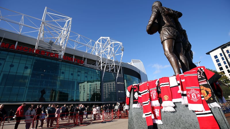 Fans have flocked to Old Trafford to leave flowers, scarves and messages following Sir Bobby Charlton’s death (Barrington Coombs/PA)