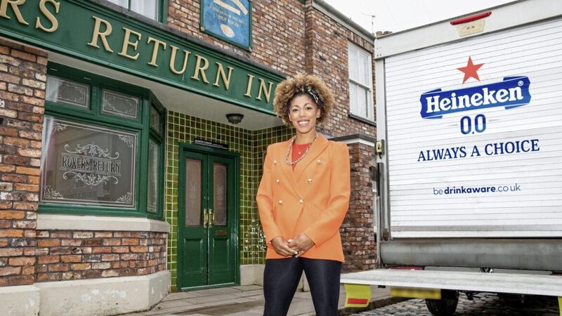 Dr Zoe Williams outside the Rovers Return pub on Coronation Street as the soap embraces alcohol-free beer. 