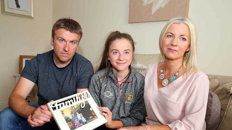 Martin and Susan Trainor, pictured with their daughter Aoife, have praised the GAA for helping them through their heartache 
