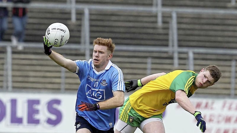 Donegal Niall O&#39;Donnell&#39;s moves in to tackle Dublin&#39;s Darren Byrne. Picture: Philip Walsh. 