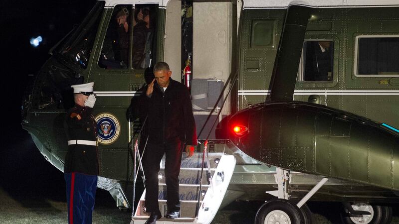 President Barack Obama exits Marine One upon his return to the White House. Picture by Cliff Owen, Associated Press&nbsp;