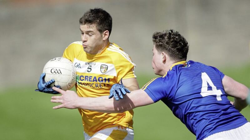 Antrim's Paddy McBride gets away from Longford's Andrew Farrell during the draw at Corrigan Park five years ago. <br />Picture by Cliff Donaldson
