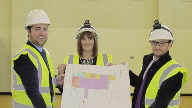 Announcing plans for Roar and Explore are (from left) Noel Rooney, Ortus Property development executive, Catherine McClelland, Roar and Explore project manager, and Conor Smith, NIHE system manager social investment team 