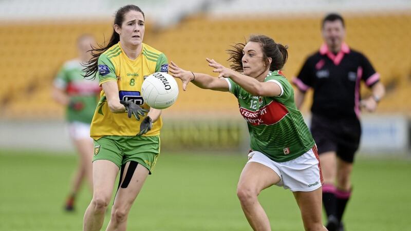 Katy Herron of Donegal in action against Niamh Kelly of Mayo during the TG4 All-Ireland Ladies Football Senior Championship Group 4 Round 3 match between Donegal and Mayo at Bord Na Mona O&#39;Connor Park in Tullamore, Offaly on July 27 2019. Picture by Ben McShane/Sportsfile 