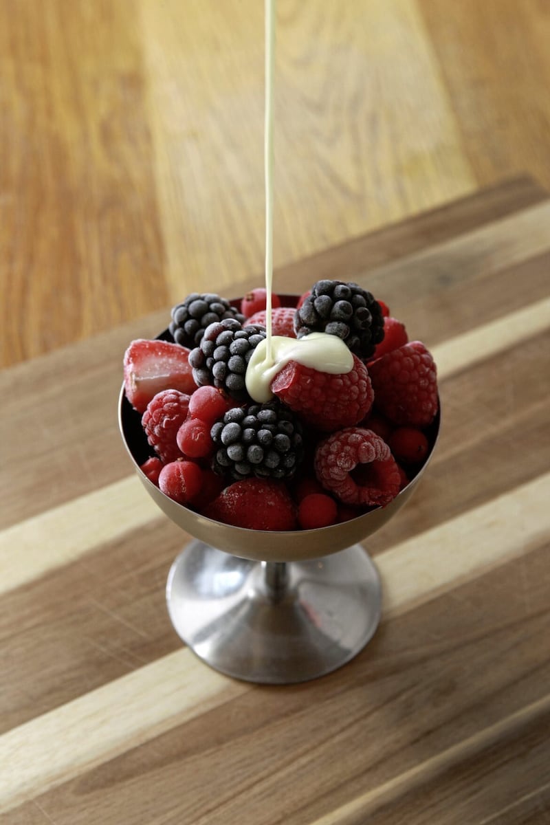 Iced berries with white chocolate sauce 