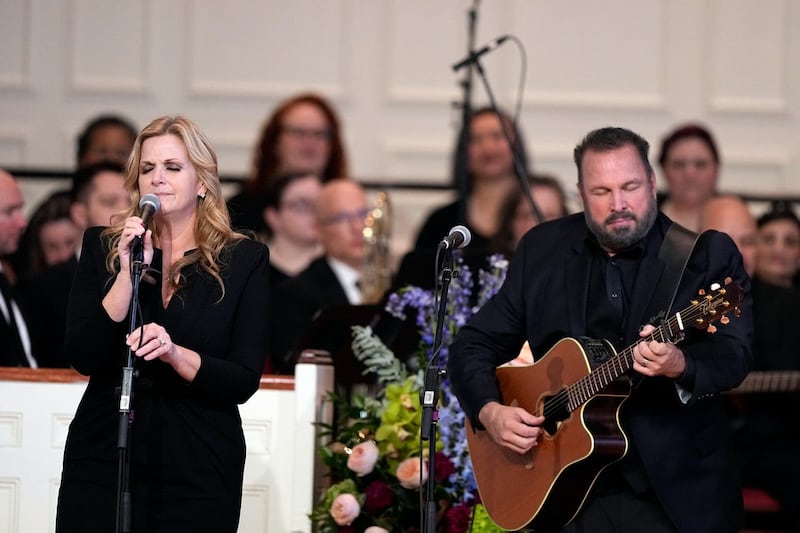 Garth Brooks and Trisha Yearwood perform Imagine at a tribute service for former first lady Rosalynn Carter at Glenn Memorial Church at Emory University in Atlanta