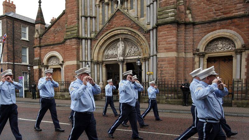 Finaghy True Blues band passing St. Patrick&#39;s Church yesterday 