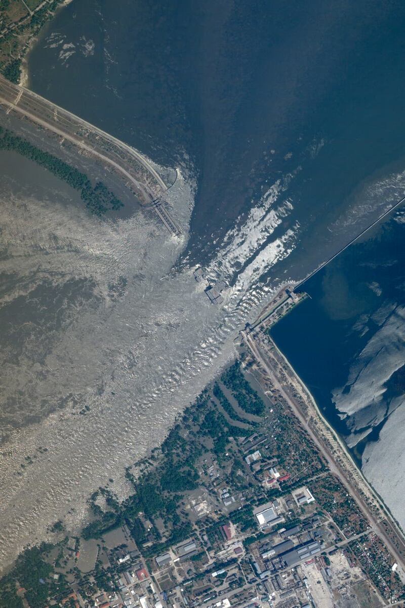 This satellite image provided by Planet Labs PBC shows an overview of the damage on the Kakhovka dam in southern Ukraine 