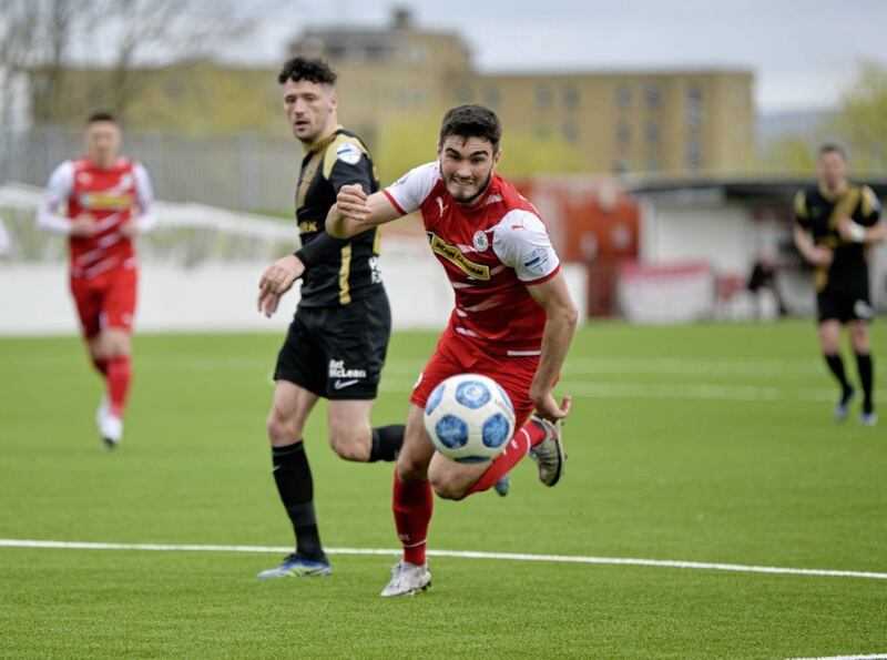 Cliftonville&#39;s Luke Turner chases the ball during the Dankse Bank Premiership game with Larne at Solitude Picture: Andrew McCarroll/ Pacemaker Press. 