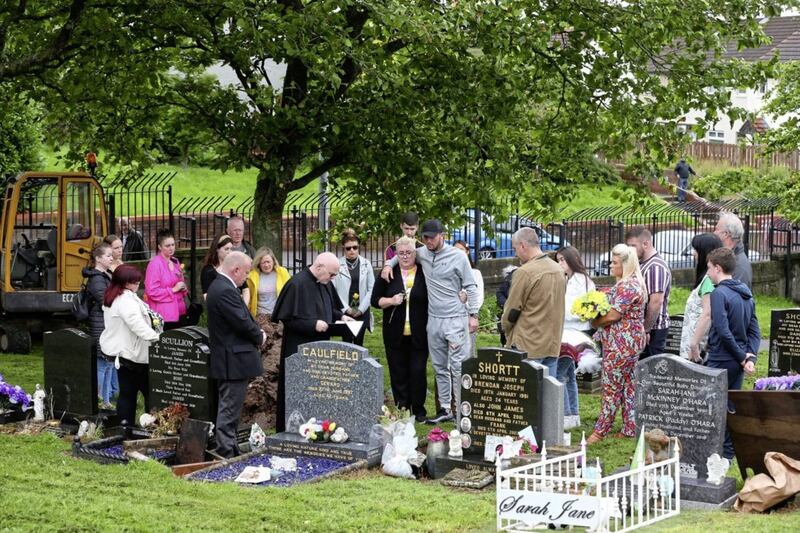 The family of Joleen Corr gathered at her grave in City Cemetery in west Belfast yesterday for a special service. During the gathering, items which had been held back by the authorities as evidence in the murder investigation, including the young woman&#39;s brain and some tissue material, were buried with the 27-year-oldThe family of Joleen Corr gather at her grave for a special final service. Picture Mal McCann. 