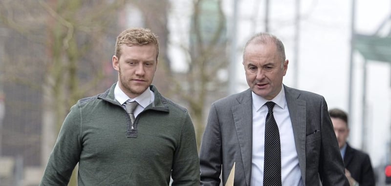 Ulster and Ireland rugby player Stuart Olding arrives at Laganside Court with solicitor Joe Rice. Picture by Pacemaker 