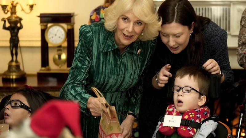 Camilla helped decorate the Christmas tree at Clarence House (PA)