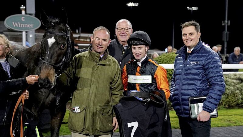 Winning jockey Oisin Murphy and trainer Michael Appleby (left) in the parade ring with Jupiter Express after winning the Winning Connections Networking Handicap at Chelmsford 