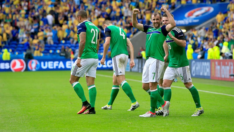 <span style="color: rgb(68, 68, 68); font-family: Verdana, Arial, Helvetica, sans-serif; font-size: 12.1px; line-height: 16.5px;">Northern Ireland's Niall McGinn celebrates with team mates after scoring the second against Ukraine</span>