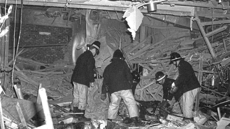 Firemen at work following the bomb attacks in Birmingham city centre that targeted the Mulberry Bush pub and the Tavern in the Town in 1974 