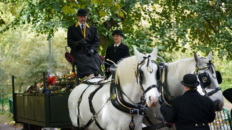Heath and Nobby pulled flatbed drays filled with bouquets laid in Green Park, to Kensington Gardens where the flowers will be turned into compost.