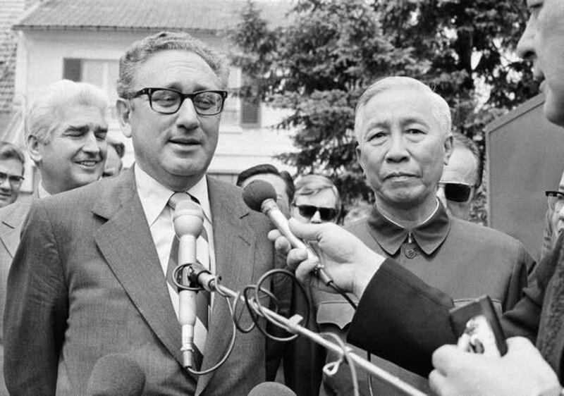 Henry A Kissinger, left, and Le Duc Tho (Michel Lipchitz/AP)