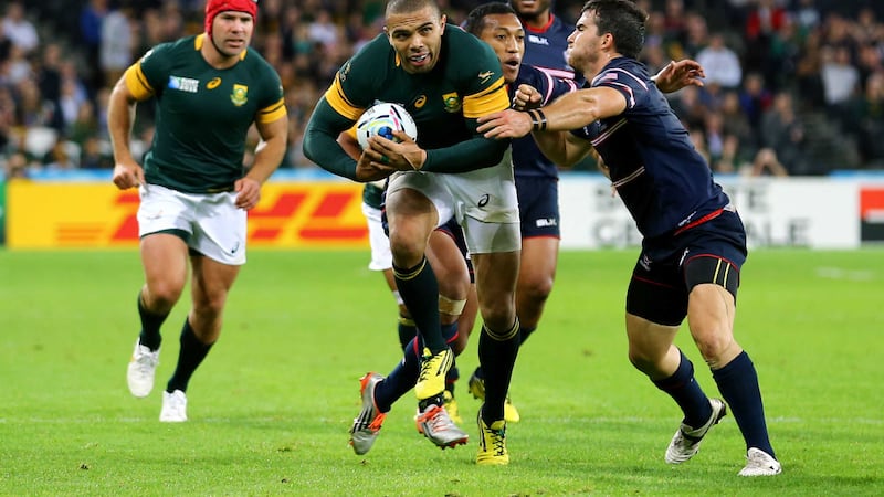 South Africa's Bryan Habana looks to break the tackle of the USA's Niko Kruger during the World Cup match at the Olympic Stadium, London on Wednesday<br />Picture: PA
