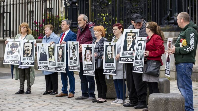 &nbsp;Families of those killed during the Ballymurphy Killings stand holding images of loved ones outside The Crown Court in Belfast