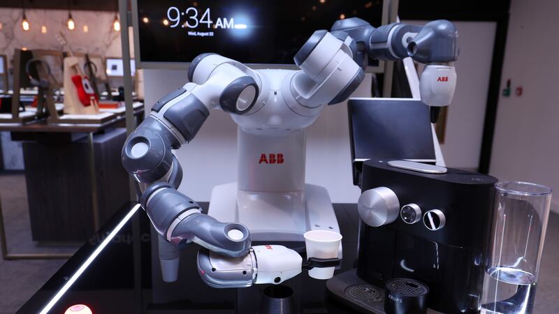 Who needs a coffee machine when a robot can do the whole thing for you?