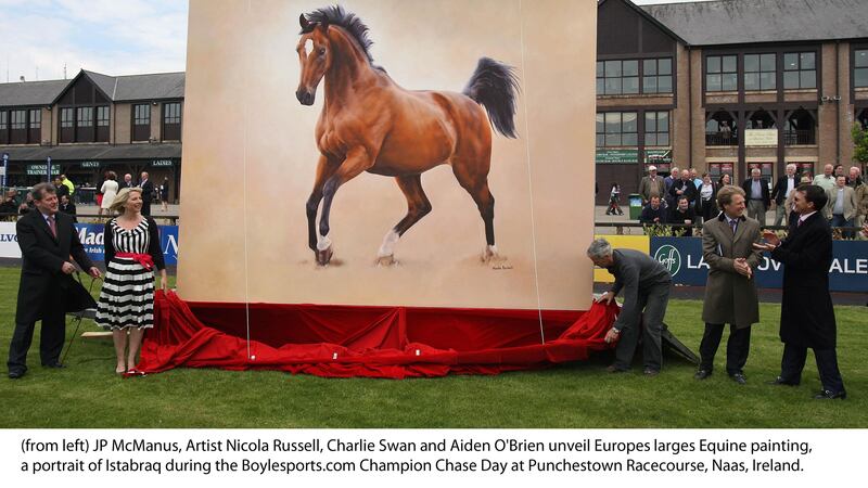 Pictured from left: JP McManus, artist Nicola Russell, Charlie Swan and Aiden O'Brien unveil Europe's largest equine painting, a portrait of the famous Istabraq, during the Champion Chase Day at Punchestown racecourse in Naas on Tuesday May 3 2011