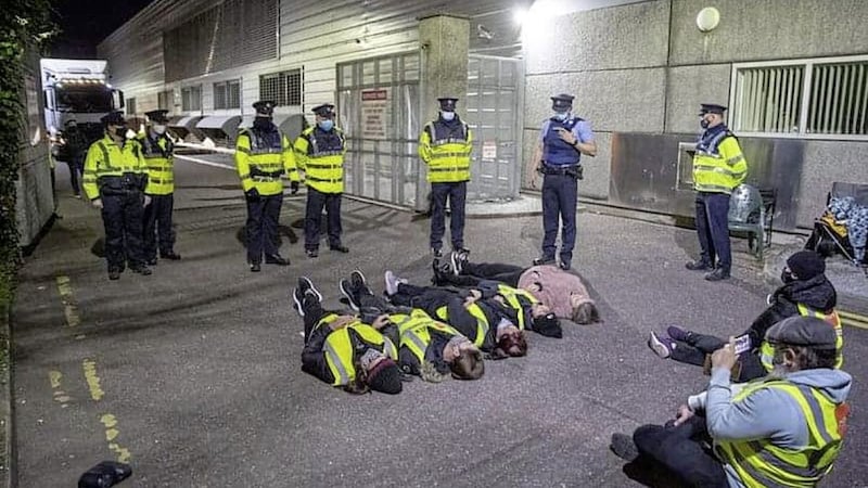 Workers lying down during a Debenhams picket in Tralee, Co Kerry, last year. Picture by Dominic Walsh 