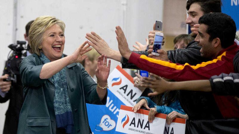 Democratic presidential candidate Hillary Clinton arrives to speak at a campaign event at Rainier Beach High School in Seattle 
