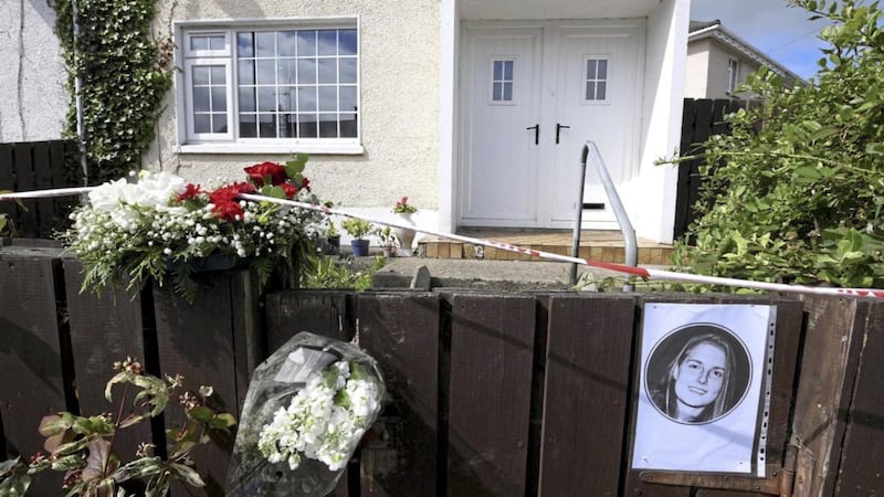 A photo of Patrycja Wyrebek was left outside the house where she found dead on Sunday. Picture by Justin Kernoghan/ Photopress 