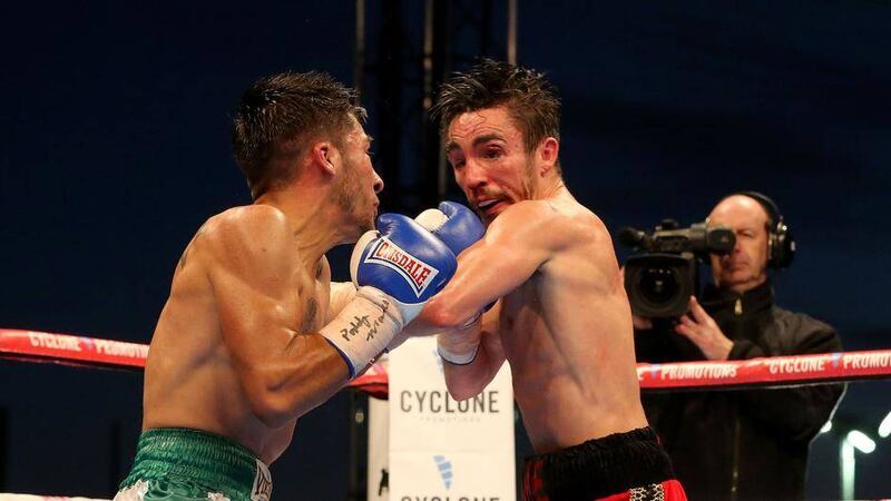 Jamie Conlan (right) in action against Jose Estrella during their WBO Intercontinental title fight in Belfast 
