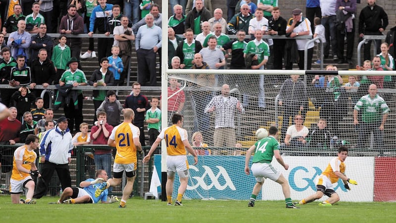 Antrim's Kevin O'Boyle saves a last minute shot from Fermanagh's Ryan McCluskey off the line during the 2014 Ulster Senior Championship quarter-final at Brewster Park&nbsp;<br />Picture by Colm O'Reilly&nbsp;