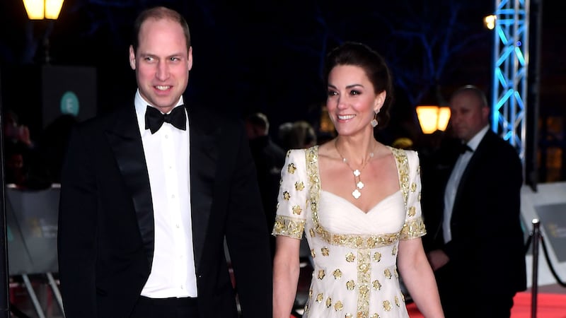 The Duke and Duchess of Cambridge walked down the recycled red carpet outside the Royal Albert Hall.