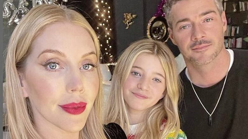 Comedian Katherine Ryan is among a host of celebrities who put up their Christmas decorations seven weeks early. The 39-year-old is pictured with her daughter, Violet and partner, Bobby Kootstra 