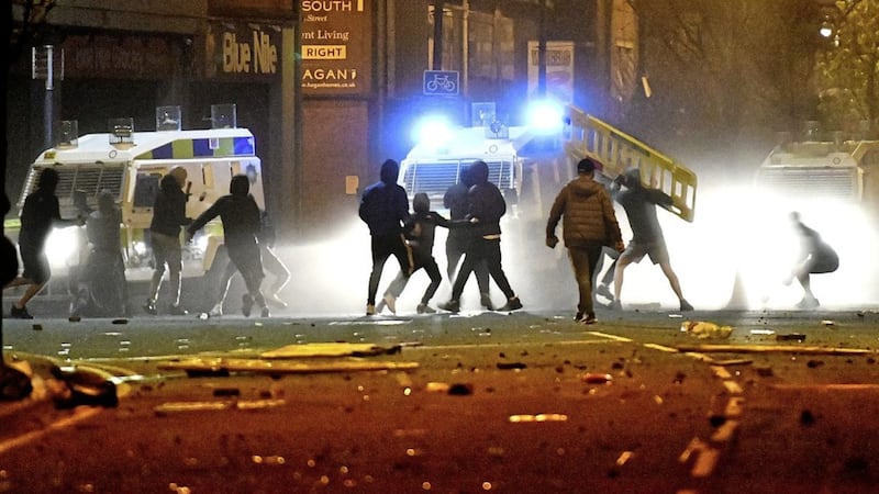 Loyalists clash with police in Belfast earlier this month 