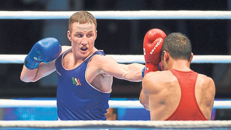 Michael O'Reilly, left, exchanges punches with Hosam Abdin, Egypt, during their Men's Middleweight 75kg Box-Off bout. AIBA World Boxing Championships, Semi-Finals. Picture by Paul Mohan, Sportsfile  &nbsp;