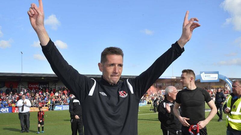 Crusaders Stephen Baxter celebrates after his side won the League in April 