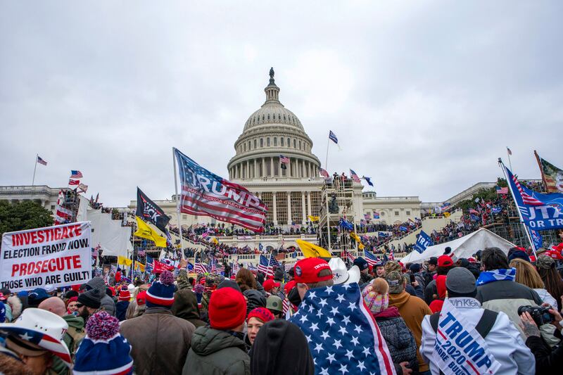 Rioters loyal to Donald Trump at the US Capitol in Washington on January 6 (Jose Luis Magana/AP, File)