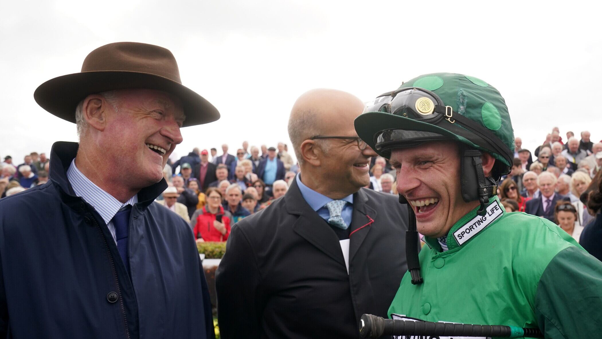 Paul Townend (right) can guide Cash Back to victory for trainer Willie Mullins (left) at Cork on Monday