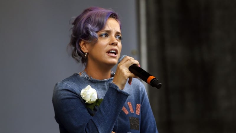 Lily Allen tells Tommy Robinson: 'you will be hearing from my legal team' in Twitter row over migration