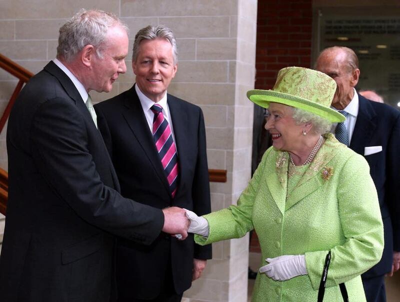 The late Queen shook hands with Martin McGuinness at an event organised by Co-operation Ireland in 2012 (Paul Faith/PA)