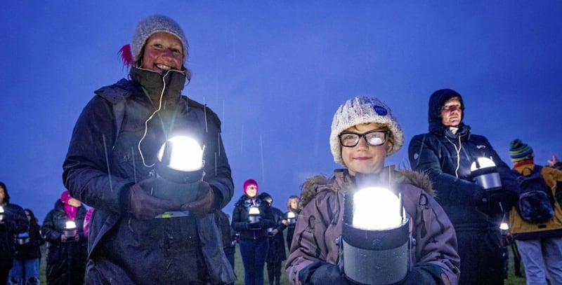 Participants carried the handheld Geolights. Picture by Brian Morrison 