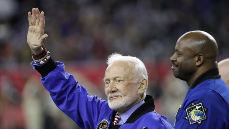 From Buzz Aldrin to Usher, take a look at how celebrity fans enjoyed the Super Bowl