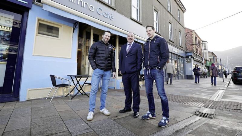 Brothers Charles (left) and James Small (right) pictured with Derick Wilson, business development manager at Ulster Bank 
